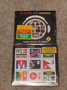 Playing for Change Songs Around the World & PFC 2, CD & DVD Lot - Bild 1 von 4