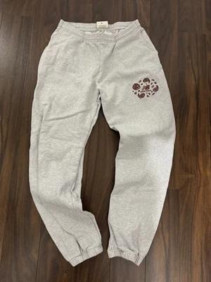 Pantalones deportivos New Balance X gris ladrillo y madera - talla grande raros buen estado usados Foto 1 de 2