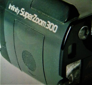 Olympus Infinity Superzoom 300 Kamera Akkufachklappe. NEU - Bild 1 von 4