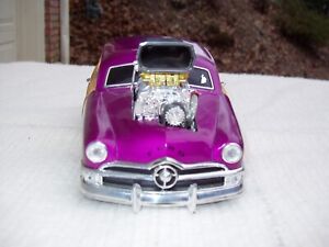 1950 Ford Woody Station Wagon, mint 1:18 scale die cast Muscle Machine series.