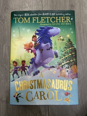 A Christmasauras Carol book - Image 1 of 4