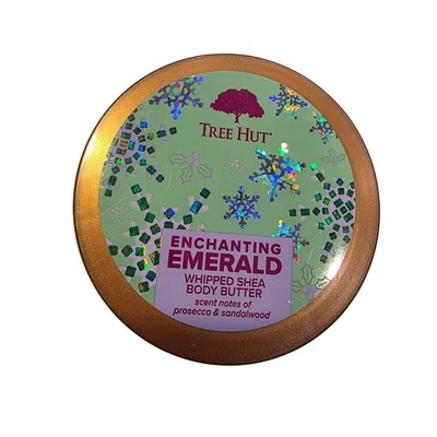 Cabaña de árbol encantadora esmeralda batida manteca corporal de karité prosecco sándalo vacaciones Foto 1 de 3