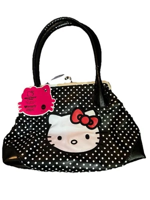 Cartera Hello Kitty Lounge Fly blanca y negra Polk A Dot Foto 1 de 4