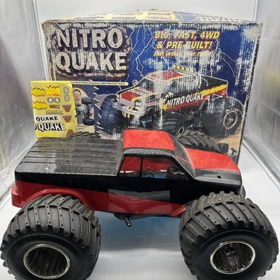 Coche de radiocontrol Duratrax Nitro Quake de colección escala 1/8 con caja PAQUETE pegatinas extras COMO ESTÁ Foto 1 de 4