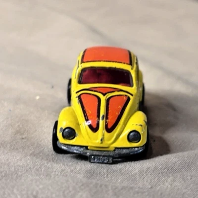 Coche diecast vintage 1977 Tomica F20 amarillo Volkswagen Beetle 1:60 Foto 1 de 4