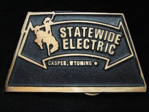 OB21164 *NOS* VINTAGE 1970s **STATEWIDE ELECTRIC** SOLID BRASS BELT BUCKLE - Picture 1 of 2