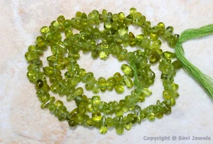 Peridot 6-8 mm lang x 3-4 mm breit Seitenbohrer einfache Tropfen Edelstein Perlen 14 Zoll Strang - Bild 1 von 2