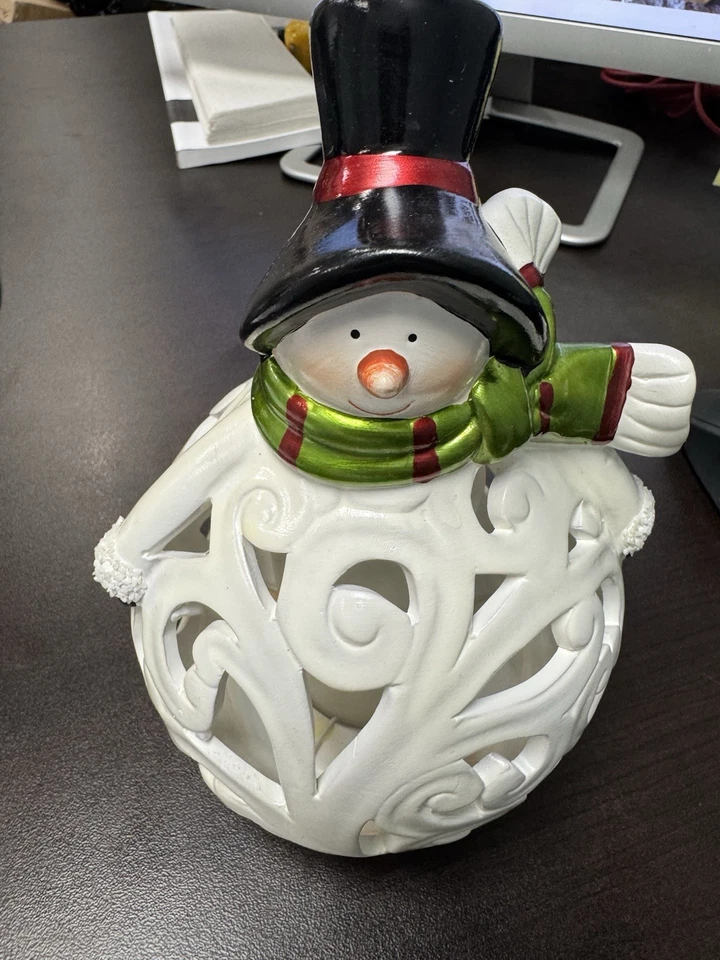 Luminaria muñeco de nieve de cerámica navideña con vela sin llama con temporizador 7,5" Foto 1 de 2