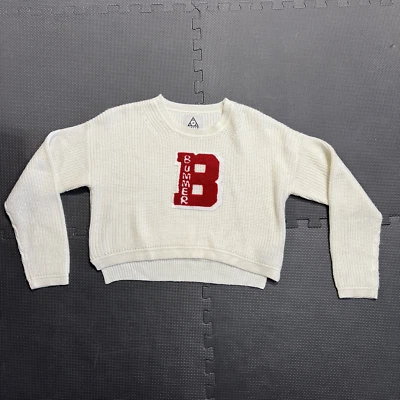 Suéter UNIF Bummer Cheerleading Para Mujer Talla XS Crema Letra Ganador Foto 1 de 4