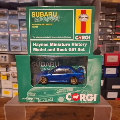 Corgi Subaru Impreza con Haynes libro de historia miniatura Ref CC03012 1/43rd Foto 1 de 4
