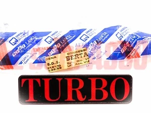 SCRITTA SIGLA TURBO LANCIA DELTA 1.6 HF ORIGINALE 82423995 - Imagen 1 de 3