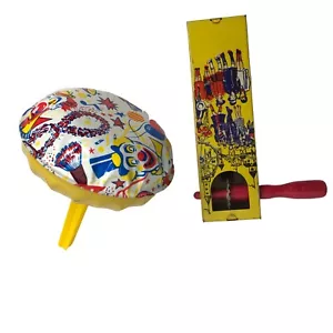 Juego de 2 juguetes vintage para hacer ruido de hojalata 1928 Kirchhof circo payaso amarillo - Imagen 1 de 9