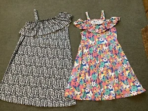 2 x Girls Off the Shoulder Dresses. Age 9-10 (black/white) Age 9 (Floral) - Picture 1 of 6