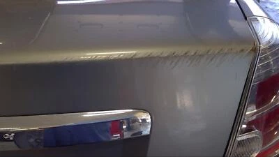 Used Deck Lid fits: 2010 Nissan Sentra 2.0L w/o spoiler w/remote keyless entry G - Image 1 of 4