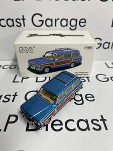 596 Model Jeep Wagoneer Blue w/ Wood Sides 1:64 Diecast - Picture 1 of 2