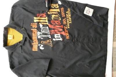 PLATINIUM FUBU MUHAMMAD ALI "A TRILLA IN MANILA" 100% POLY BLACK SHIRT sz 2XL - Image 1 of 4