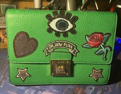 Bolso de mano Aldo Oh How Punk verde Foto 1 de 4