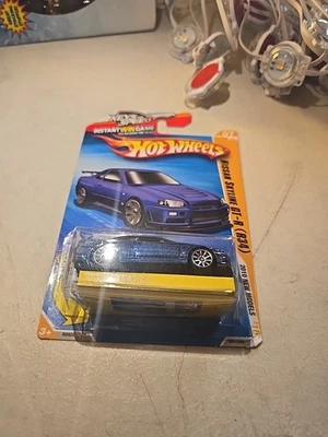 Hot Wheels 2010 New Models Nissan Skyline GT-R (R34) w/ Keychain - Free Shipping - Image 1 of 3
