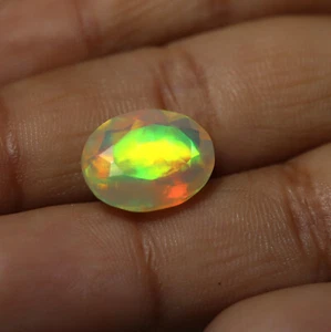 2,9 kt 12,2 x 9,6 mm Natürlicher AAA Grün Gelb Rot Feuer Äthiopischer Opal Ovalschliff - Bild 1 von 9
