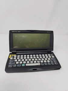 Hewlett Packard HP 320LX Palmtop PC 1997 TESTATO - senza cavo o stilo - Foto 1 di 10
