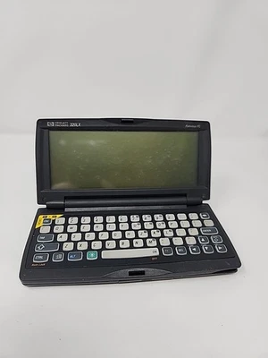 Hewlett Packard HP 320LX Palmtop PC 1997 TESTED - No cable or stylus - Image 1 of 4