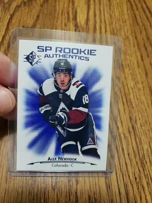 2021-22 UD SP Hockey Rookie Authentics Blue #140 Alex Newhook Colorado NM-MT  - Image 1 of 2
