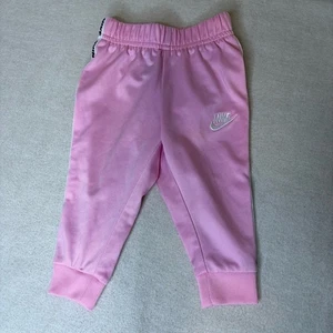 Pantaloni da jogging Nike rosa pista bambina logo taglia 6M - Foto 1 di 8