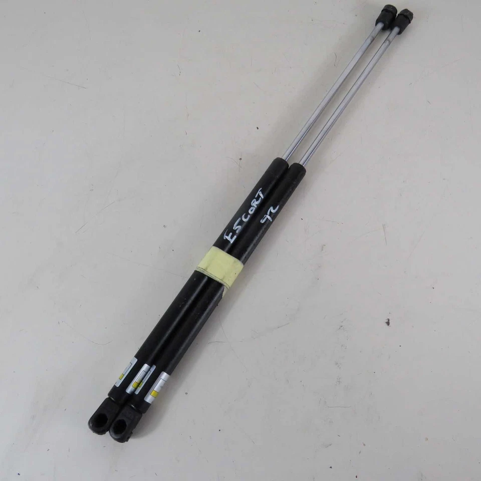 Pistoncini bagagliaio baule Ford Escort Mk4 facelift 1992-1995 (37832 J-9-E-7) Foto 1 de 1