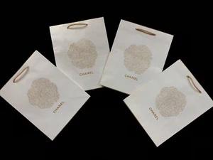 Neue authentische Chanel Papier Geschenktüte - gelb & gold - 11" L x 8,5" B x 4,5" T - Bild 1 von 10