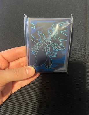 Mega Charizard X EX Fiamme Spettrali - 65 Sleeves Sealed Pokemon - Immagine 1 di 3