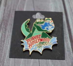 Planet Hollywoood Orlando Dinosaur Eating Earth Enamel Pin - Picture 1 of 2