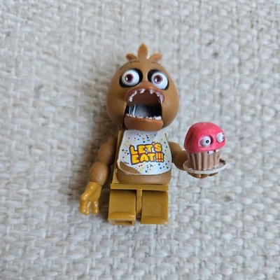 Minifigura McFarlane Five Nights At Freddy's FNAF Withered Chica Foto 1 de 4