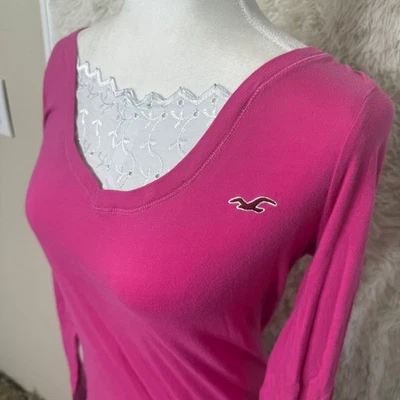 Top Babydoll Hollister Rosa Cuello en V Manga Larga con Ribete Foto 1 de 3