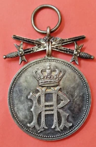 Originale Fürstlich Reußische Verdienstmedaille 2. Modell mit Schwertern - Bild 1 von 2