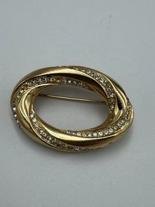 Broche ovalado firmado Christian Dior chapado en oro cristal estrás - Imagen 1 de 6