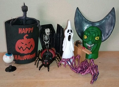 Lote Mixto De Juguetes Monstruo De Colección Gritando Fantasma Truco Serpiente y Esqueleto Flotante Ataúd Foto 1 de 4