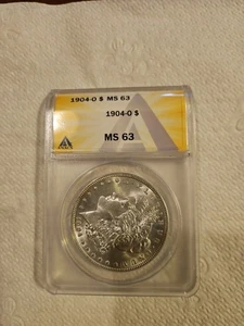 1904-O Morgan Silver Dollar ANACS MS63 - Picture 1 of 4