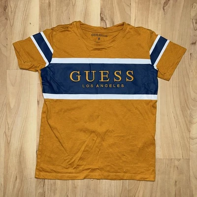 adivina niños niños camiseta talla 8 cuello redondo manga corta frontal logo marrón y azul Foto 1 de 3