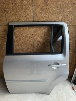 Puerta trasera Honda Pilot 2009-2015 lado del conductor alabastro plateada OEM Foto 1 de 4