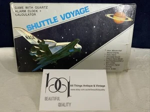 SHUTTLE VOYAGE-VINTAGE HANDHELD TABLETOP ARCADE GAME & CLOCK CALCULATOR Complete - Bild 1 von 13
