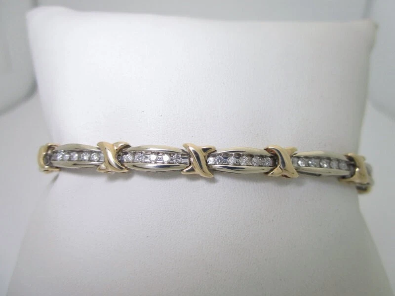 Bonita pulsera de tenis moissanita corte redondo de 2 quilates 7" en chapada en oro bicolor de 14 quilates Foto 1 de 4