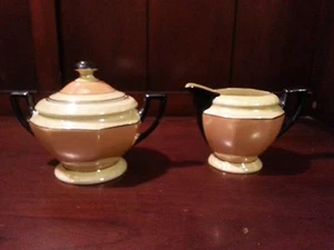 P.A.L.T. Tschecho-Slowakei~Sahnekännchen~Zuckerdose mit Deckel~Glanzware~Pfirsich~gelb~schwarz - Bild 1 von 8