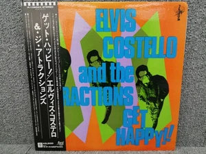 ELVIS COSTELLO THE ATTRACTIO Model Number P 10804X F BEAT - Picture 1 of 7