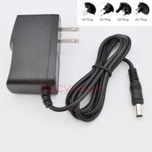 1 M US/UK/EU/AU Plug 5.5*2.5mm Black Adapter AC DC Power Supply Charger 10V 1A - Afbeelding 1 van 15