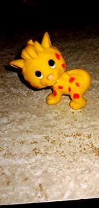 Vintage Flintstones Yellow Orange Spots Baby Puss Saber Tooth 2" PVC Figure - Picture 1 of 3