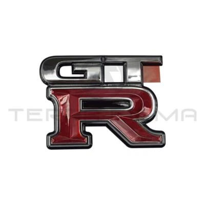Emblema maletero Nissan Skyline R34 GTR Foto 1 de 3