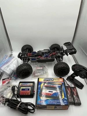 ECU Traxxas E-Revo 1/8 Castle MXL-6s con baterías, cargadores y extras leer Foto 1 de 4