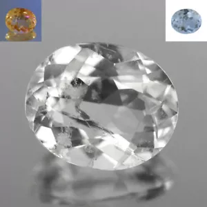 0.60 Ct Oval 6.2 x 5.1 MM 100% Natural White - UV Orange to UV Blue Scapolite !! - Picture 1 of 5
