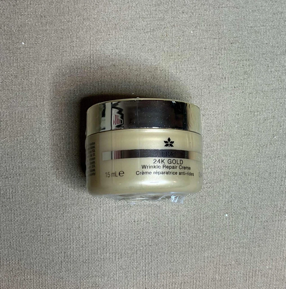 NUEVO Sellado PRAI 24K Oro Crema Reparadora de Arrugas 0.5 Fl Oz Foto 1 de 1