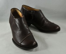 white and gold nike high tops